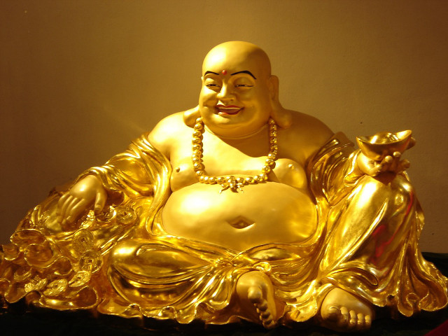 Golden buddha statue black table free wallpaper - medium preview image