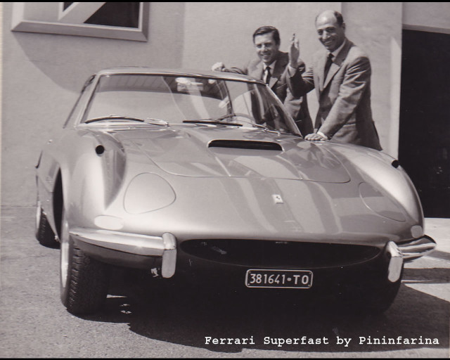 Two men sports car building free wallpaper - medium preview image