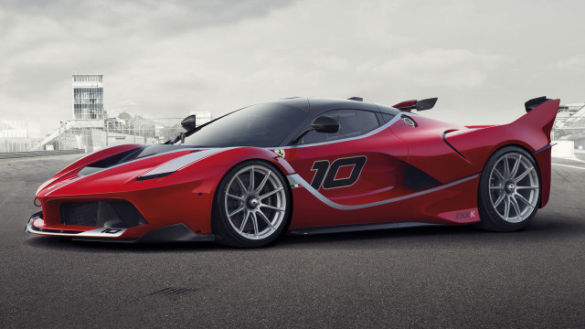Red sports car city road free wallpaper - medium preview image