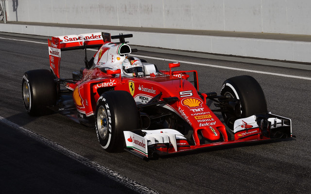 Man driving red race car #2 free wallpaper - medium preview image