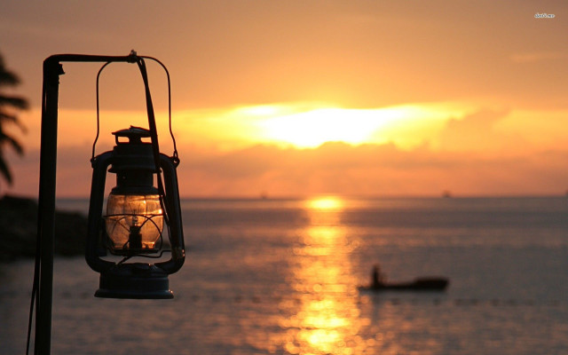 Lantern ocean sunset mountain reflection free wallpaper - medium preview image