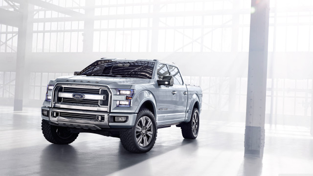 Silver truck parked building light free wallpaper - medium preview image