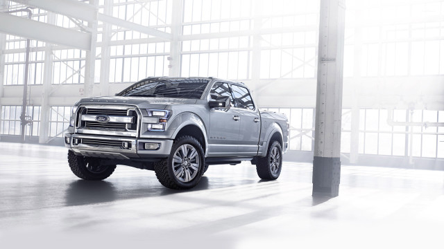 Silver truck large building sky #2 free wallpaper - medium preview image
