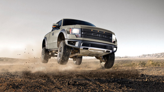 Truck jumping dirt hill desert free wallpaper - medium preview image