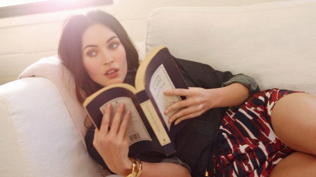 Woman couch reading surprised expression free wallpaper - medium preview image