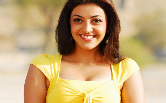 Woman yellow top smiling camera free wallpaper - medium preview image