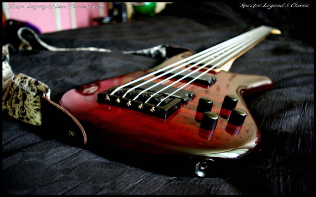 Red bass guitar black sheet free wallpaper - medium preview image