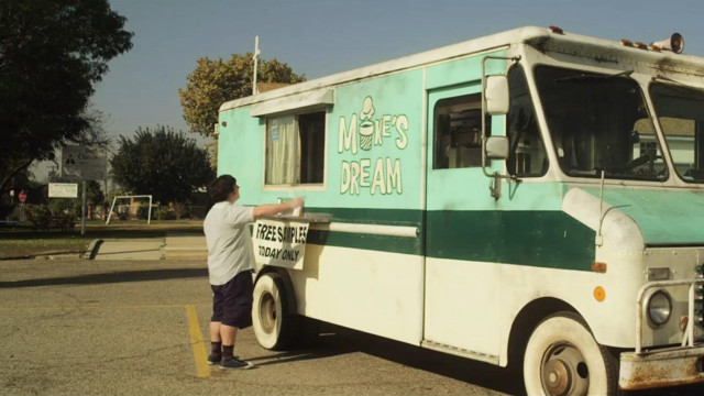 Man standing food truck sign free wallpaper - medium preview image