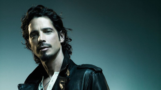 Man leatherjacket blackbackground whiteshirt curlyhair free wallpaper - medium preview image