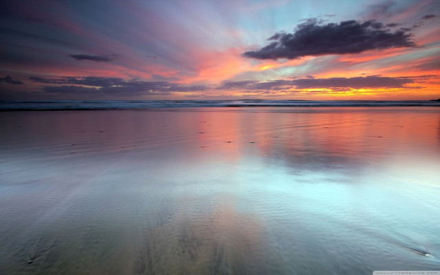 Sunset beach water clouds footprints free wallpaper - medium preview image