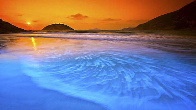 Sunset beach waves mountains orange free wallpaper - medium preview image