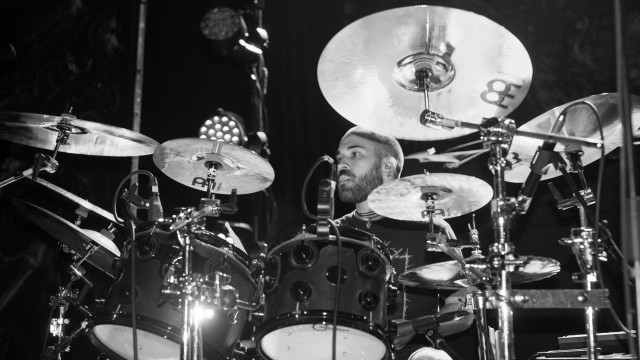 Bearded man playing drums concert free wallpaper - medium preview image