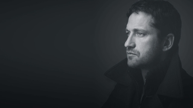 Man black coat looking distance free wallpaper - medium preview image