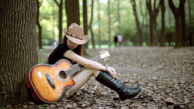 Woman sitting guitar cowboy hat #3 free wallpaper - medium preview image
