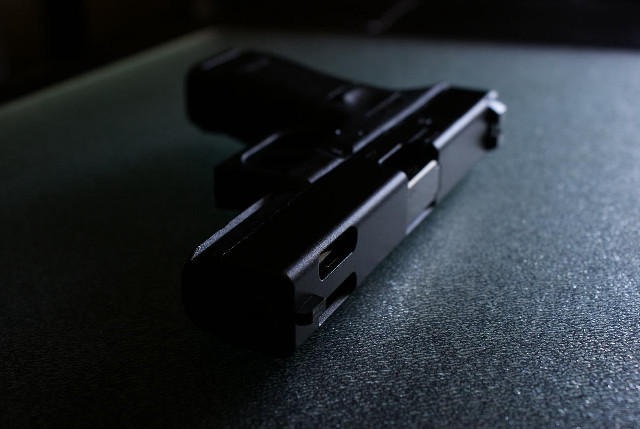 Black gun table black background free wallpaper - medium preview image