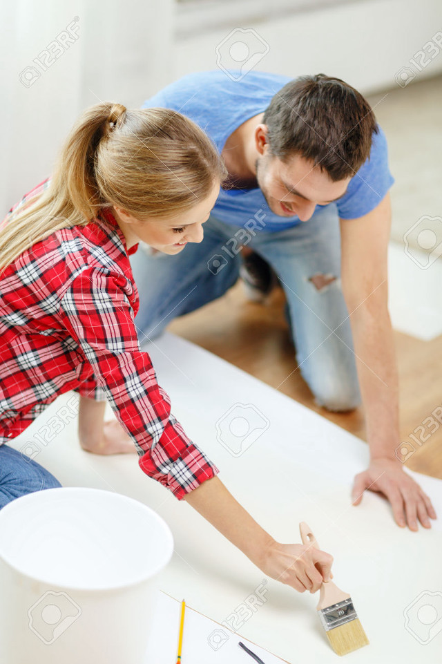 Man woman painting wall together free wallpaper - medium preview image