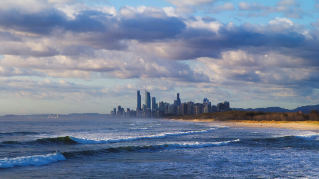 City skyline ocean waves crashing free wallpaper - medium preview image