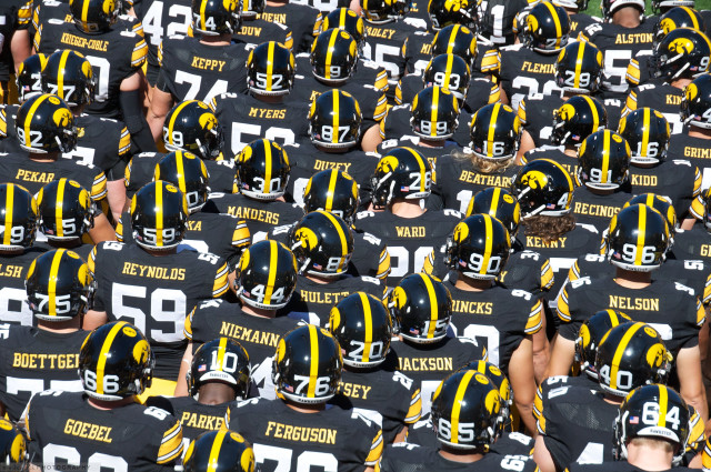 Football players black yellow uniforms free wallpaper - medium preview image