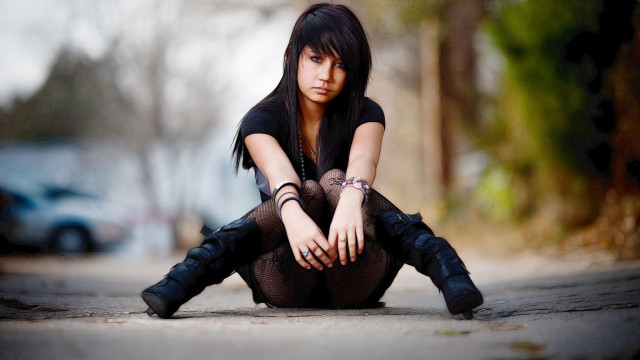 Woman sitting ground legs crossed #15 free wallpaper - medium preview image