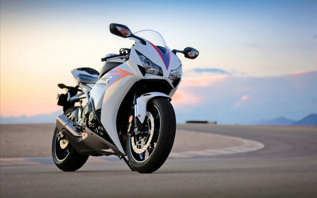 White motorcycle parked track sunset #2 free wallpaper - medium preview image