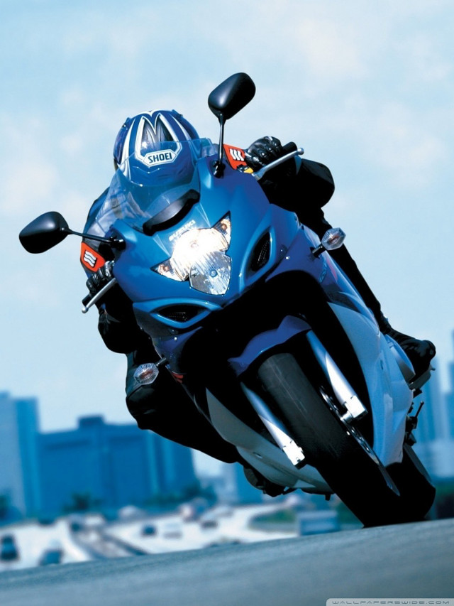 Blue motorcycle city skyline tall free wallpaper - medium preview image