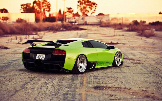 Green sports car desert sunset free wallpaper - medium preview image