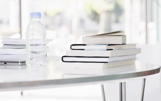 Table water bottle stack books free wallpaper - medium preview image