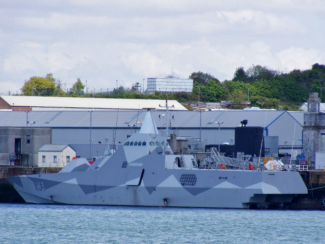 Military ship docked water building free wallpaper - medium preview image