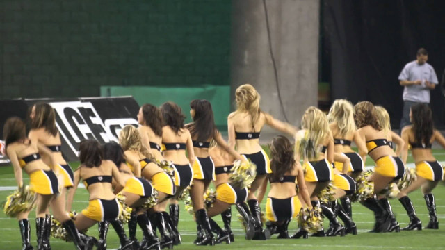 Cheerleaders performing field game man free wallpaper - medium preview image