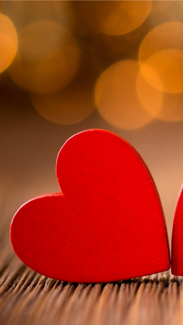 Red hearts table blurry background free wallpaper - medium preview image