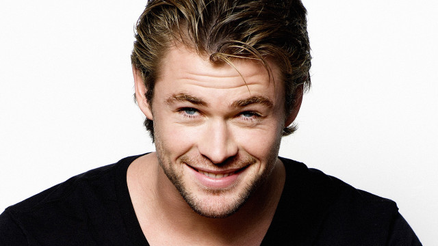 Man smiling black shirt camera free wallpaper - medium preview image