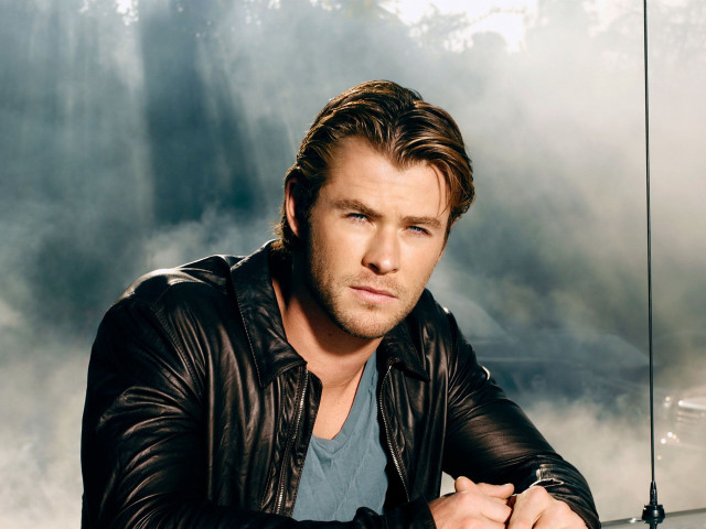Man leather jacket leaning car free wallpaper - medium preview image