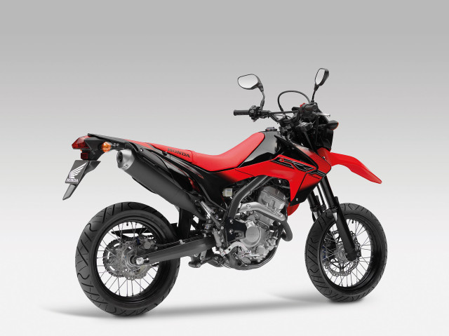 Red motorcycle white floor wall free wallpaper - medium preview image