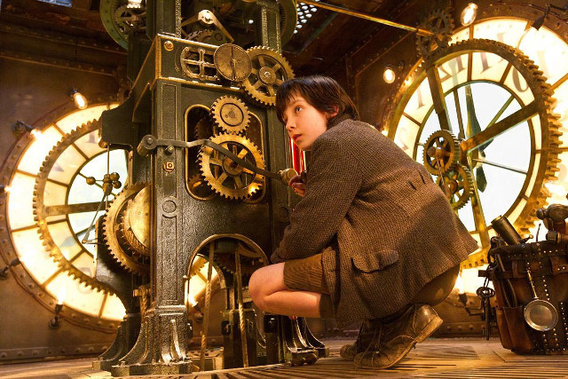 Woman kneeling clock tower gears free wallpaper - medium preview image