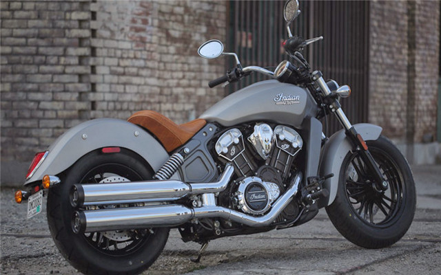 Motorcycle brick building street fence free wallpaper - medium preview image