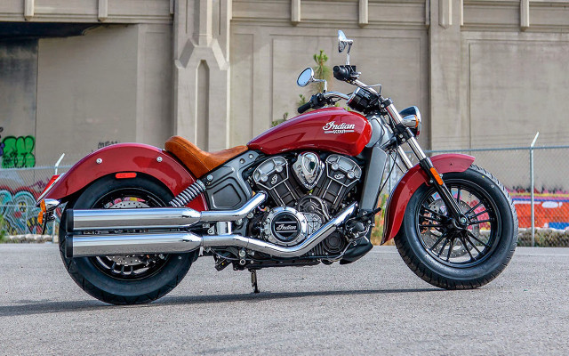 Red motorcycle graffiti building fence free wallpaper - medium preview image