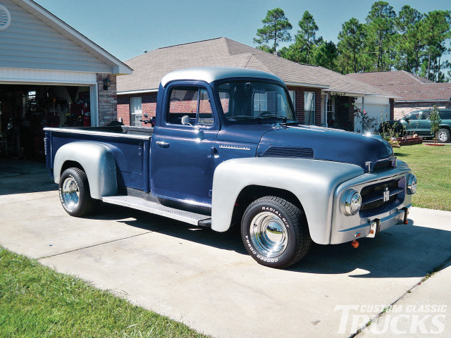 Blue truck parked house driveway free wallpaper - medium preview image