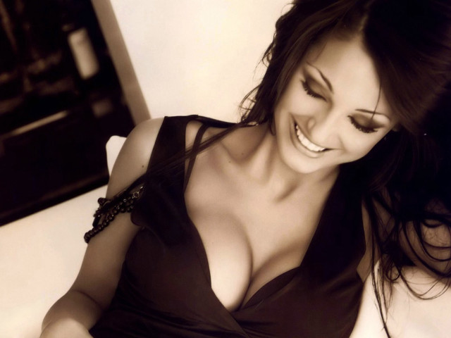 Woman smiling black and white free wallpaper - medium preview image