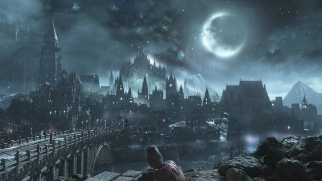 Man sitting ledge city night free wallpaper - medium preview image