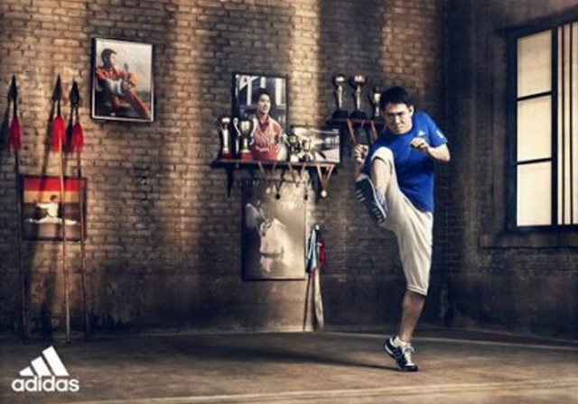 Man kicking soccer brick wall free wallpaper - medium preview image