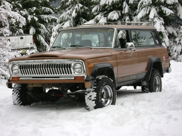 Brown jeep snow trees winter free wallpaper - medium preview image