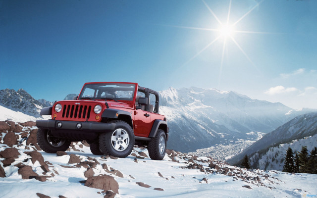 Red jeep snowy mountain sunlight free wallpaper - medium preview image