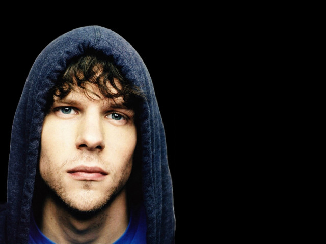 Man hoodie serious look camera #4 free wallpaper - medium preview image