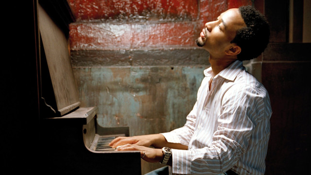 Man sitting piano eyes closed free wallpaper - medium preview image