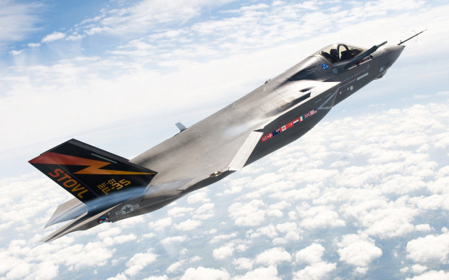 Jet flying above clouds sky #2 free wallpaper - medium preview image