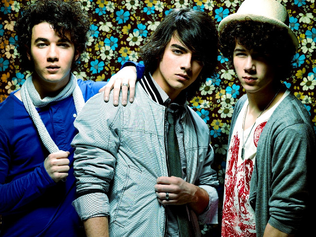 Three young men floral wall free wallpaper - medium preview image