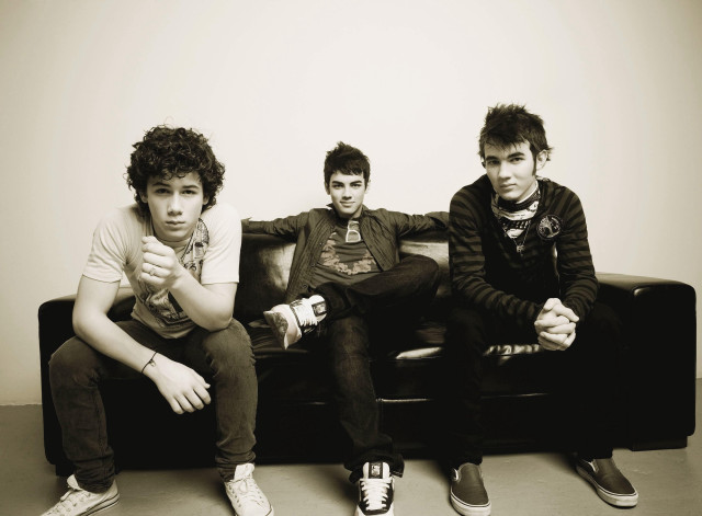 Three young men couch white free wallpaper - medium preview image