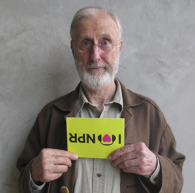 Man holding sign i love free wallpaper - medium preview image