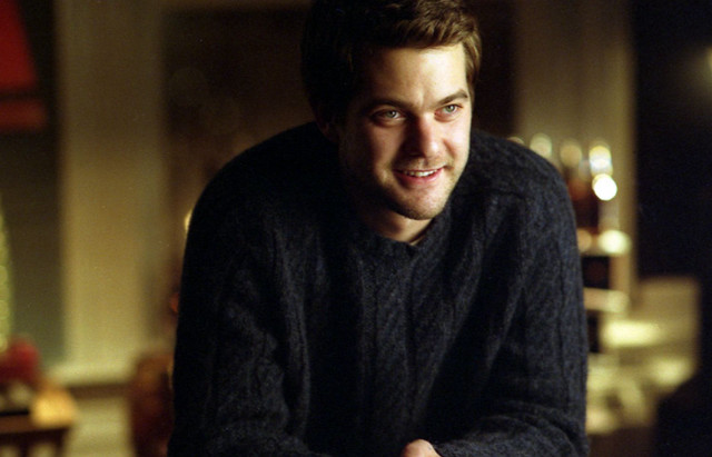 Man sitting remote smile happy free wallpaper - medium preview image