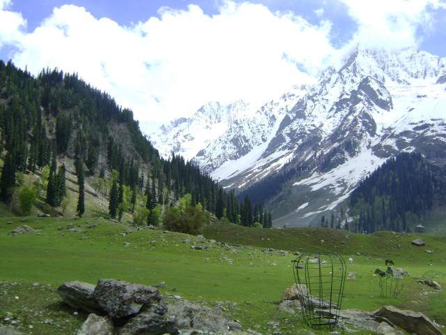 Mountain range grassy field chair free wallpaper - medium preview image